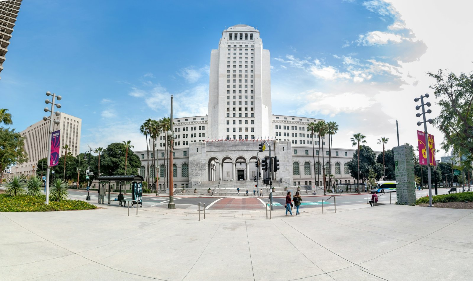 Los Angeles City Hall framed by palm trees